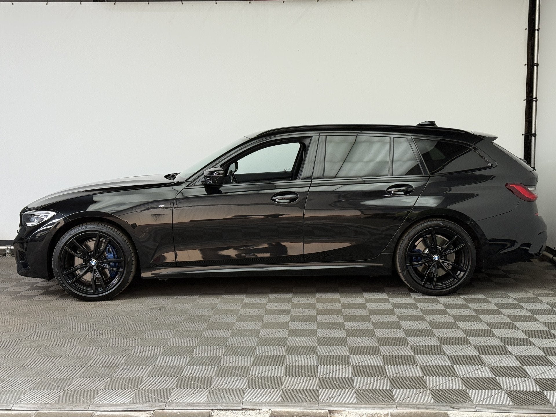 BMW 3 Serie Touring M340i xDrive High Executive Zeer Complet, Auto's, BMW, 1780 kg, Met garantie (alle), Zwart, Leder