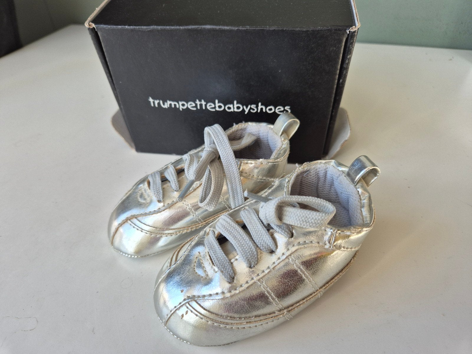 Trumpet babyschoentjes zilver, Schoentjes, Jongetje of Meisje, Ophalen of Verzenden, Zo goed als nieuw