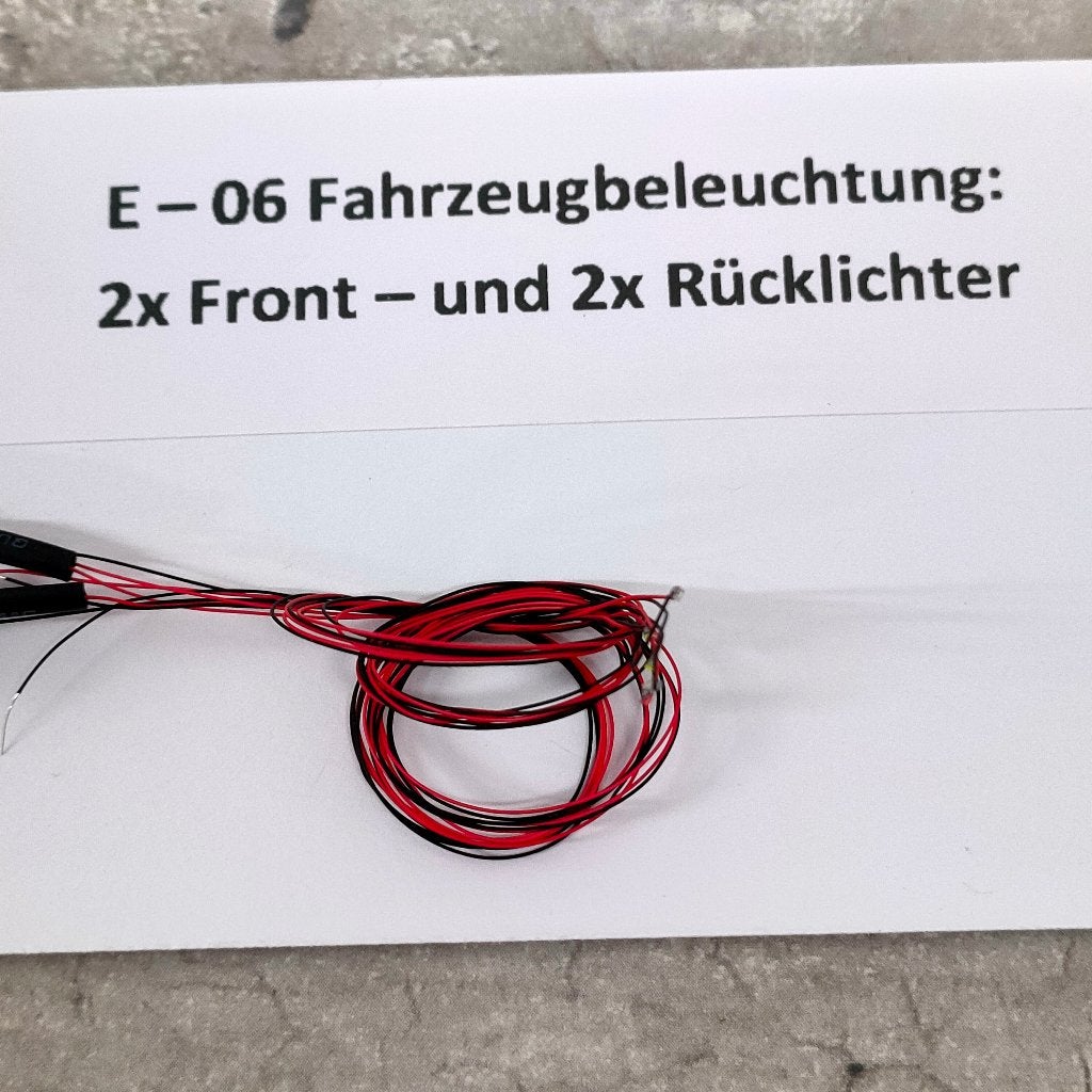 E – 06 Auto verlichting 2x Front en 2x Achterlicht, Hobby en Vrije tijd, Modeltreinen | H0, Overige merken, Transformator of Voeding