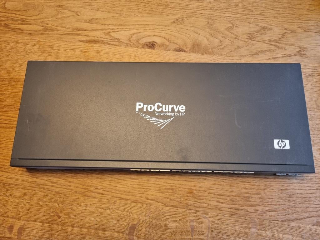 HP ProCurve 24-poorts netwerk switch 2x incl Patch panel, Computers en Software, Netwerk switches, Gebruikt, Ophalen of Verzenden