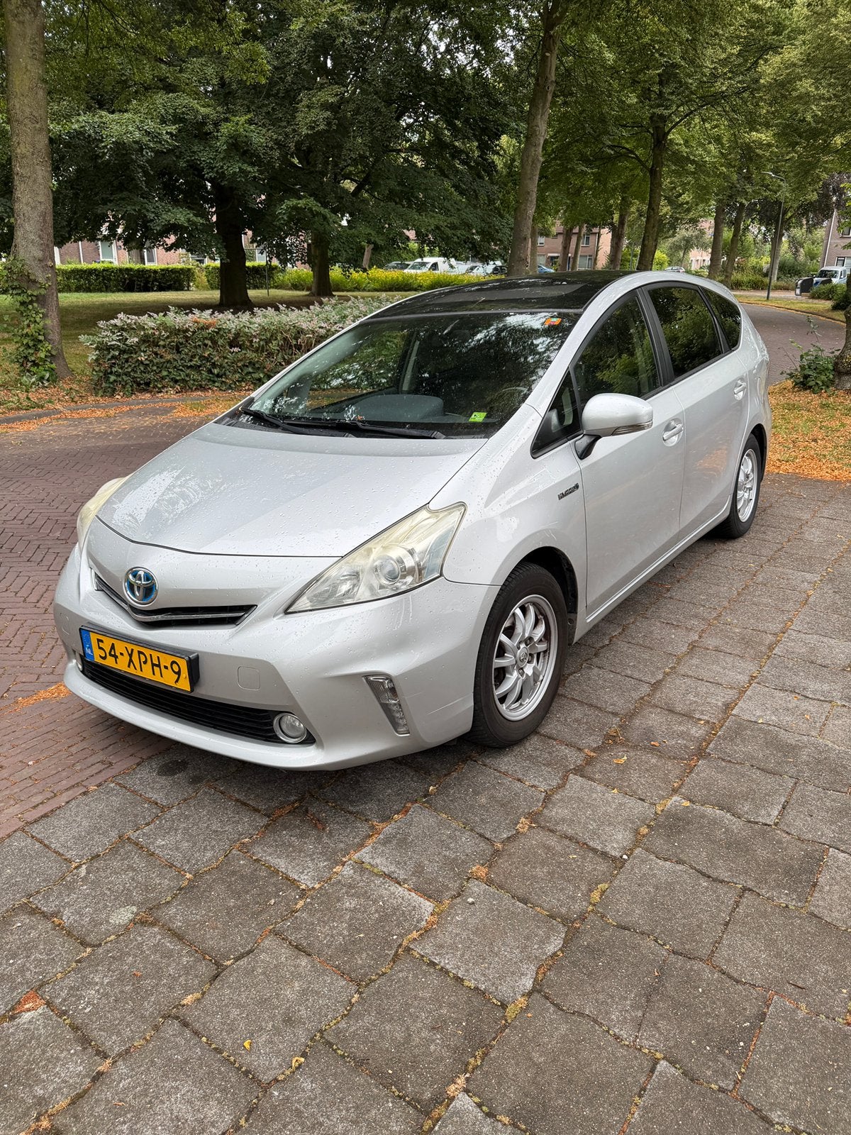 Toyota Prius Wagon 1.8 Full Hybrid 136PK Aut 96g 2012 Grijs, Auto's, Parkeersensor, 4 cilinders, 7 stoelen, Origineel Nederlands