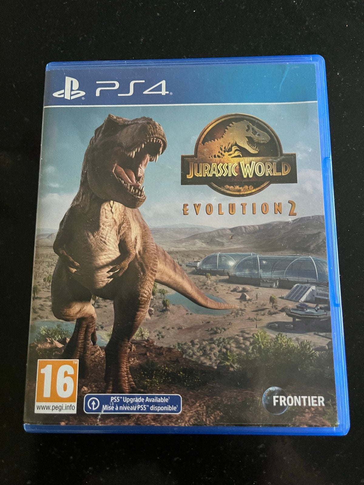 Jurassic World Evolution 2 - PS4 (met PS5 upgrade), 1 speler, Ophalen of Verzenden, Zo goed als nieuw, Vanaf 16 jaar