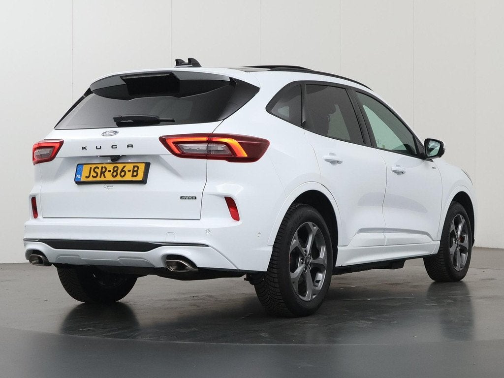 Ford Kuga 2.5 PHEV ST-Line X | Elekt inklapbare Trekhaak | P, Auto's, Ford, 14 kWh, Gebruikt, Leder en Stof, Wit
