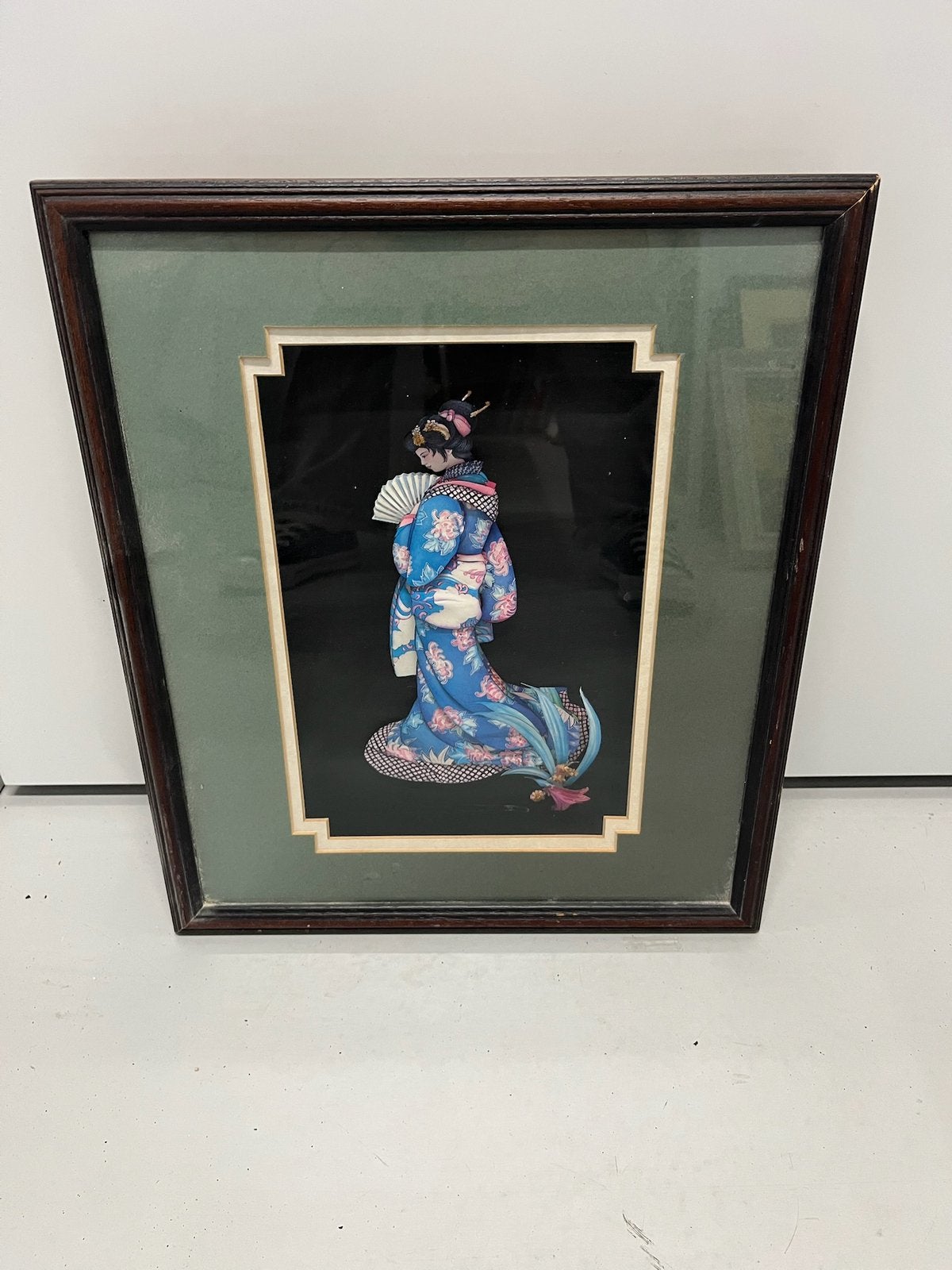 reliëfkunstwerk van een Japanse Geisha, Ophalen