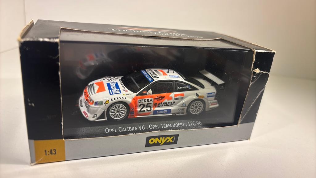 Opel calibra v6 itc 96 onyx 1.43, Hobby en Vrije tijd, Modelauto's | 1:43, Zo goed als nieuw, Auto, Overige merken, Ophalen of Verzenden