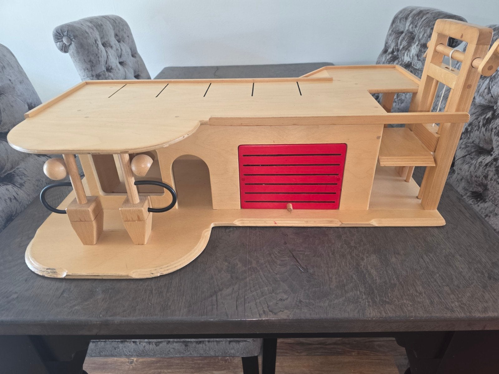 Houten autogarage, Ophalen