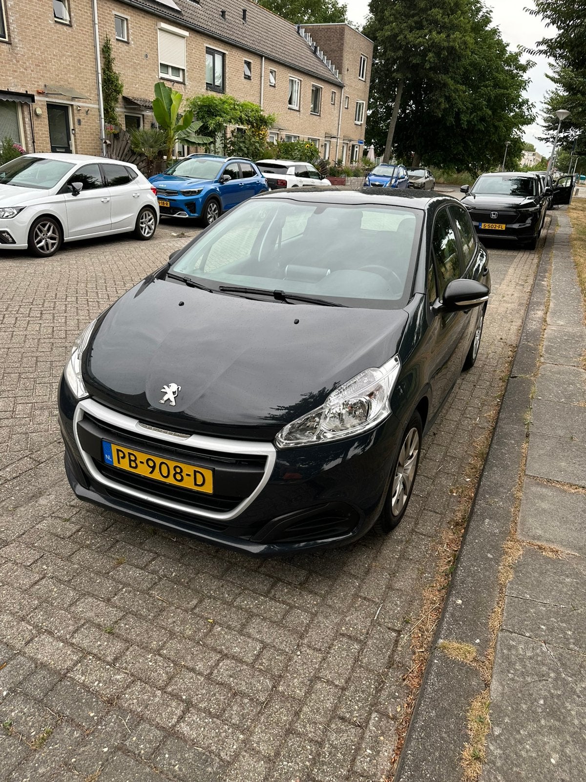 Peugeot 208 1.2 VTI 60KW/82PK 5-D 2017 Grijs, Voorwielaandrijving, 1199 cc, 23 km/l, Origineel Nederlands
