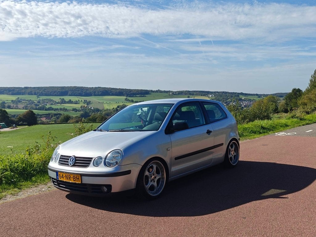 Volkswagen Polo 1.4 55KW 2005 Grijs, Auto's, Voorwielaandrijving, Stof, 4 cilinders, Origineel Nederlands
