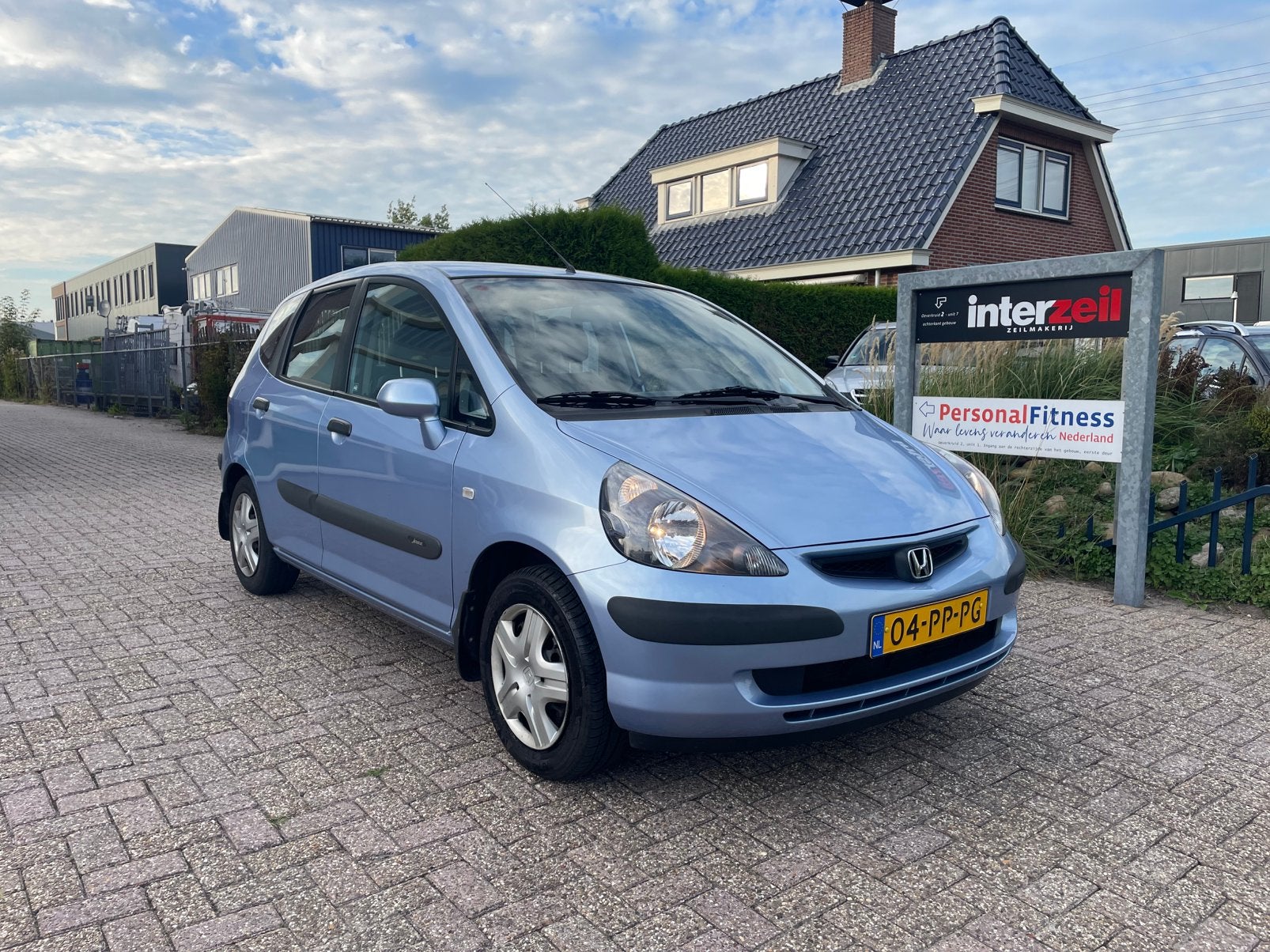 Honda Jazz 1.4 I 2004 Blauw AIRCO