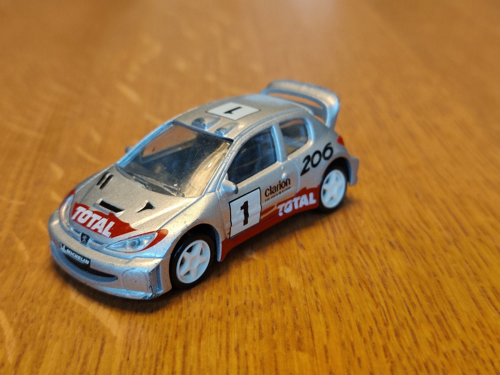 Norev Peugeot 206 WRC, Hobby en Vrije tijd, Modelauto's | Overige schalen, Ophalen of Verzenden, Zo goed als nieuw, Auto