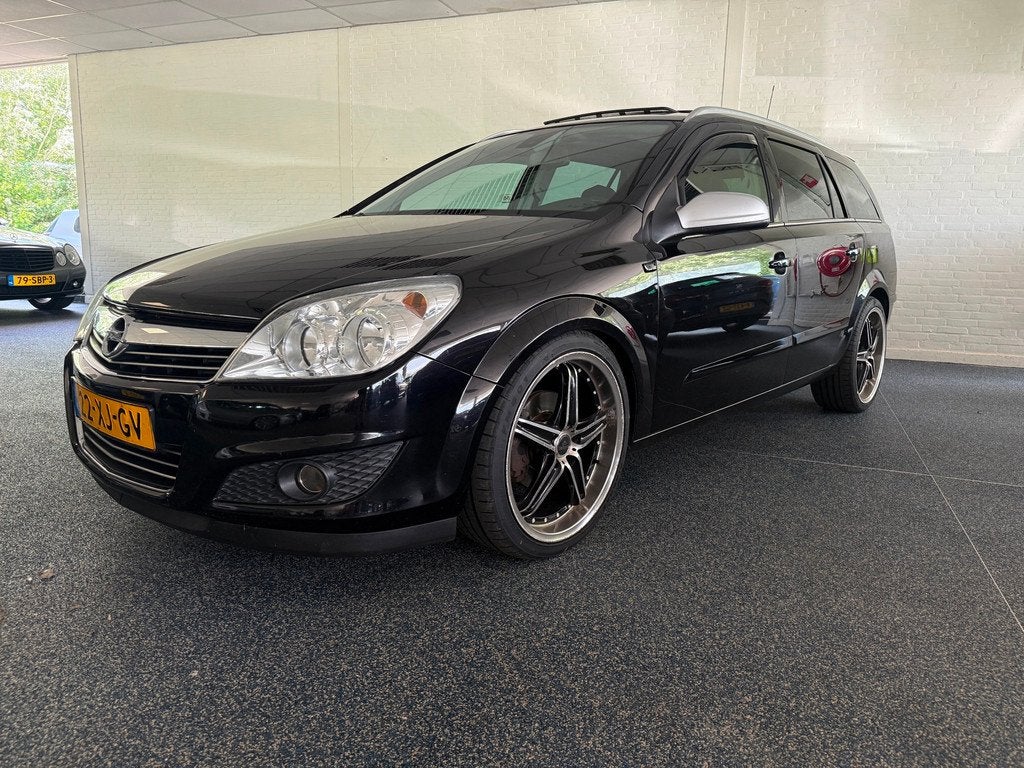 Opel Astra Wagon 1.8 Essentia | Recaro | Panoramadak | Dab+, Voorwielaandrijving, Stof, Gebruikt, 1225 kg