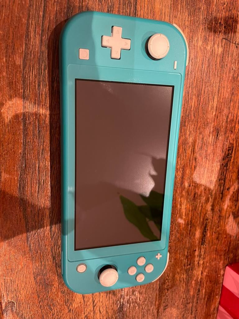 Nintendo Switch Lite, Spelcomputers en Games, Ophalen of Verzenden, Turquoise, Zo goed als nieuw, Met beschermhoes of tas