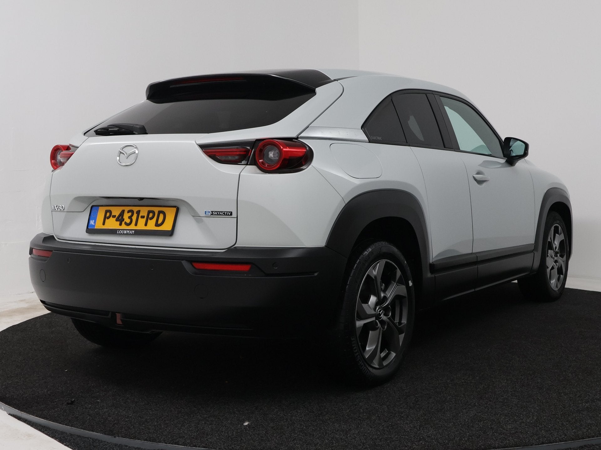 Mazda MX-30 e-SkyActiv 145 Advantage 36 kWh | Stoelgeheugen, Auto's, Gebruikt, 35 kWh, Leder en Stof, Wit