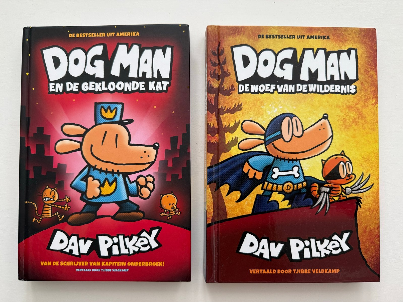 Dog Man stripboeken - De gekloonde kat & Woef van de wildern, Meerdere stripboeken, Ophalen of Verzenden, Zo goed als nieuw