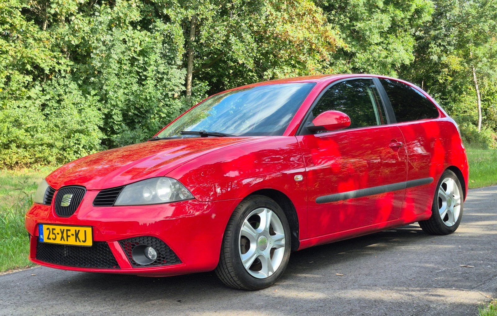Seat Ibiza 1.4 16V 63KW 3DRS 2007 Rood, Auto's, Seat, Voorwielaandrijving, 40 €/maand, 4 cilinders, Ibiza