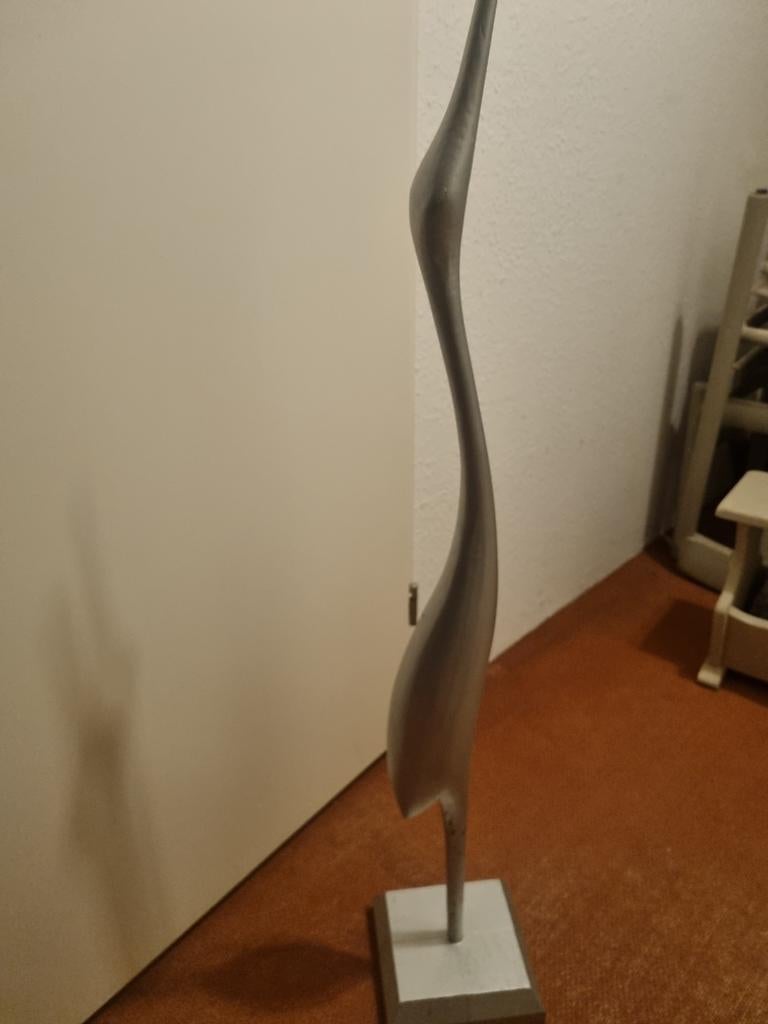 Mooie zilverkleurige vogel als decoratie, Ophalen