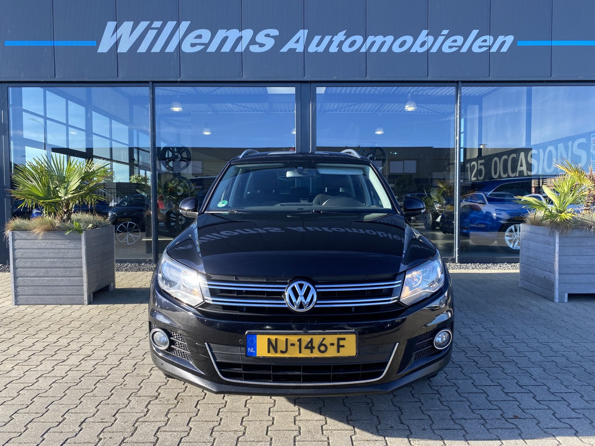 Volkswagen Tiguan 1.4 TSI Sport&Style Stoelverwarming, Trekh, Auto's, Voorwielaandrijving, Euro 5, Zwart, 4 cilinders