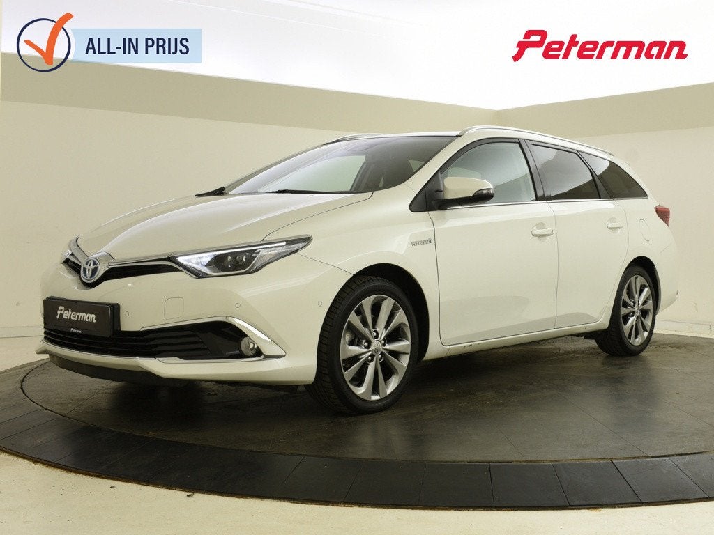 Toyota Auris Touring Sports 1.8 Hybrid Executive | Trekhaak, Auto's, 12 maanden, Gebruikt, Wit, Hybride Elektrisch/Benzine