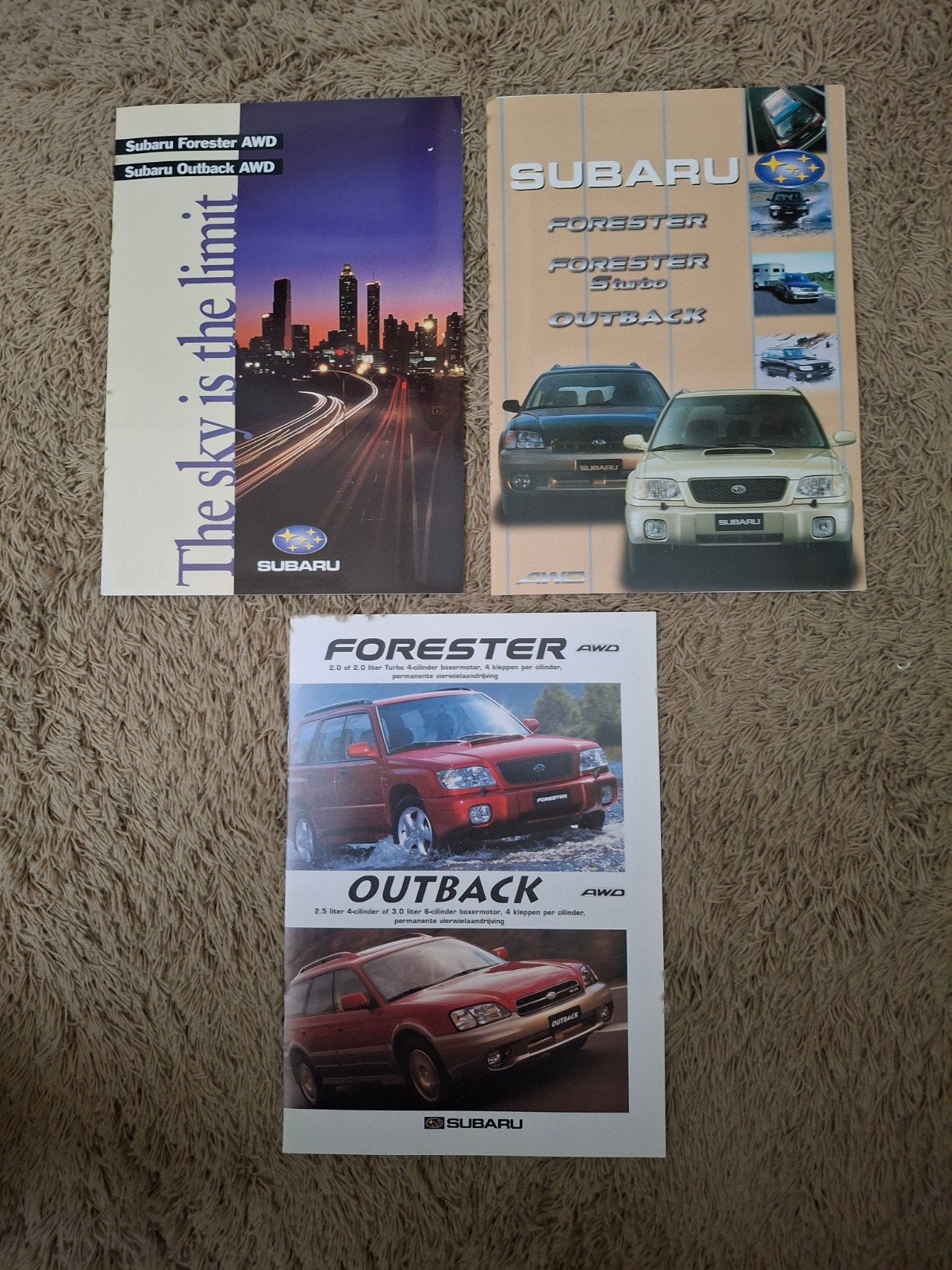 3x autofolder Subaru Forester/Outback, Verzenden, Zo goed als nieuw, Overige merken