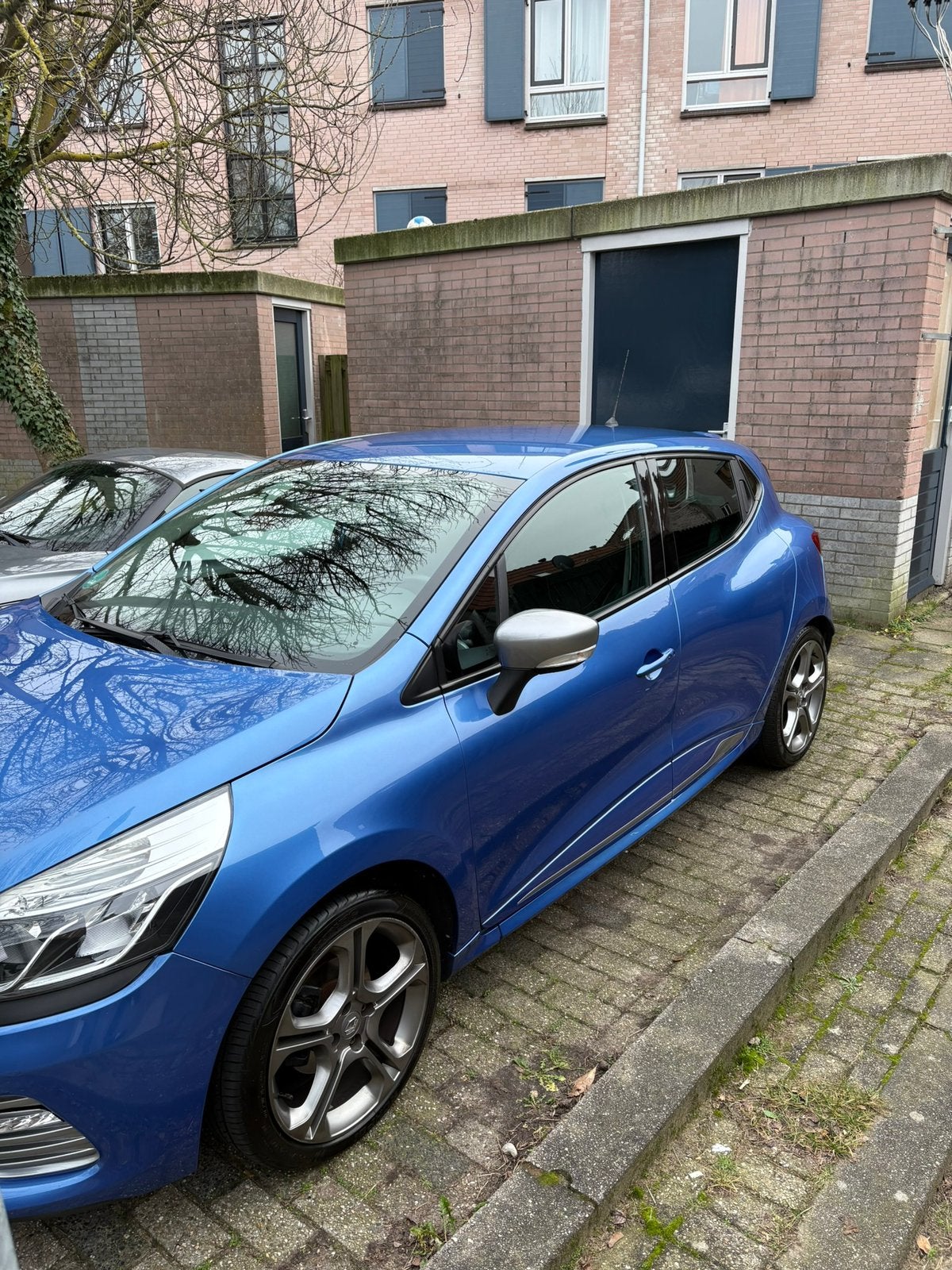 Renault Clio 1.2 GT TCE 88KW 5-DRS EDC 2015 Blauw, Auto's, Zwart, Blauw, 49 €/maand, Origineel Nederlands
