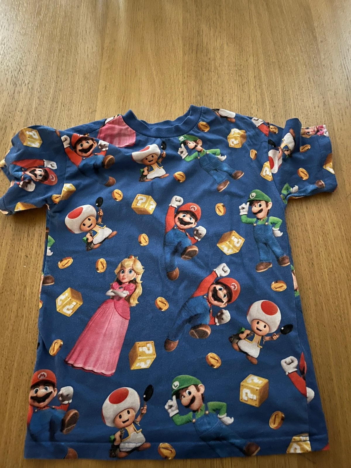 Mario tshirt maat 128, Ophalen of Verzenden, Zo goed als nieuw, Jongen, Shirt of Longsleeve