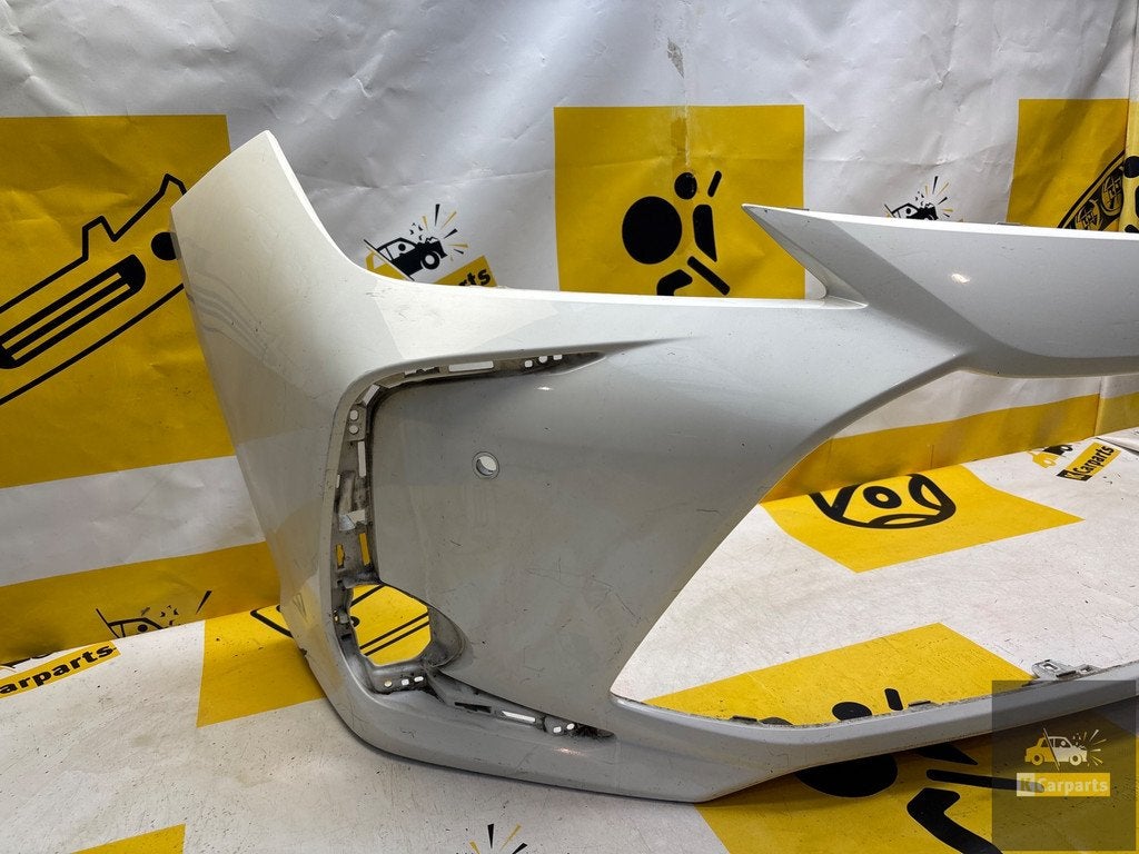Toyota Corolla E21 voorbumper PDC 53112-02D00, Info@fabrikant.eu, Ophalen of Verzenden, Toyota, Bumper
