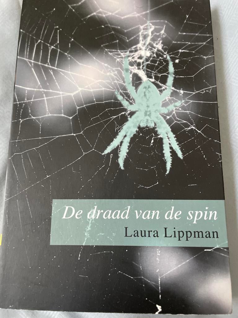 De draad van de spin - Laura Lippman (Thriller), Boeken, Ophalen of Verzenden, Zo goed als nieuw