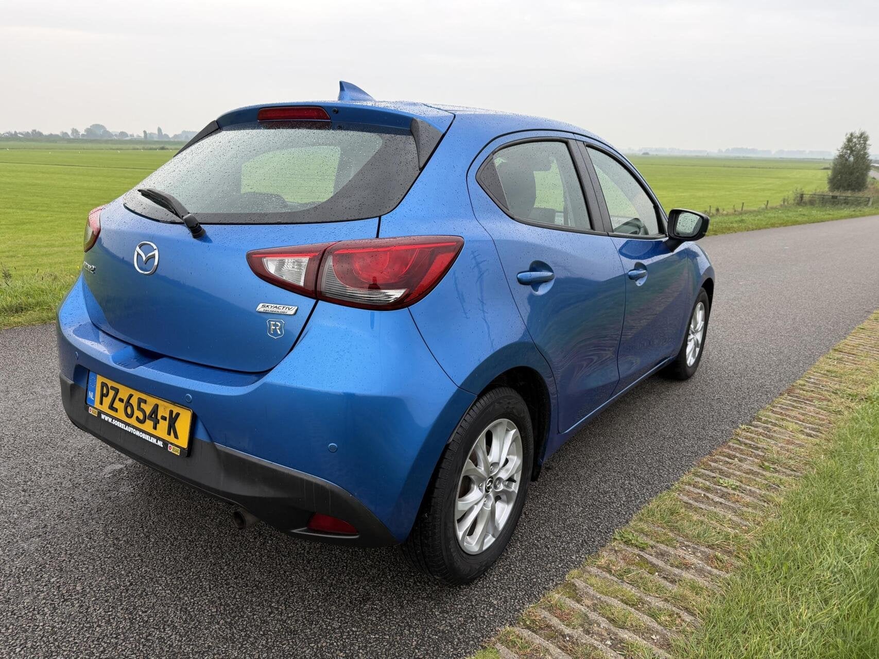 Mazda 2 1.5 Skyactiv-G Dynamic AIRCO LMV CRUISE NAV DEALER O, Auto's, Voorwielaandrijving, Gebruikt, 4 cilinders, Met garantie (alle)