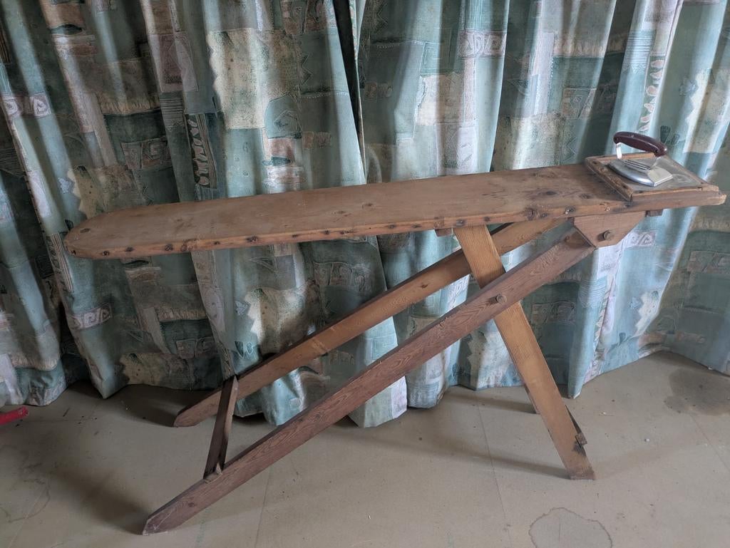 Houten strijkplank, Ophalen
