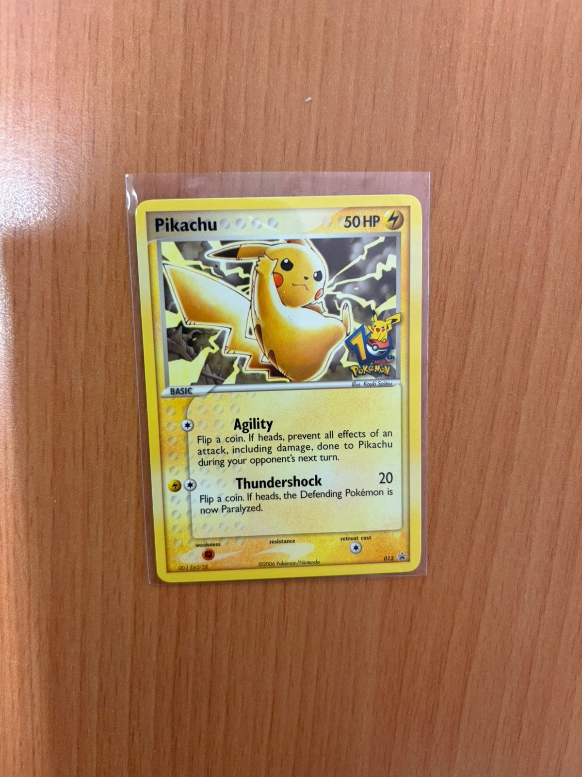 Pikachu 012 - Promo 10 year stamp Pokemon kaart, Ophalen, Zo goed als nieuw