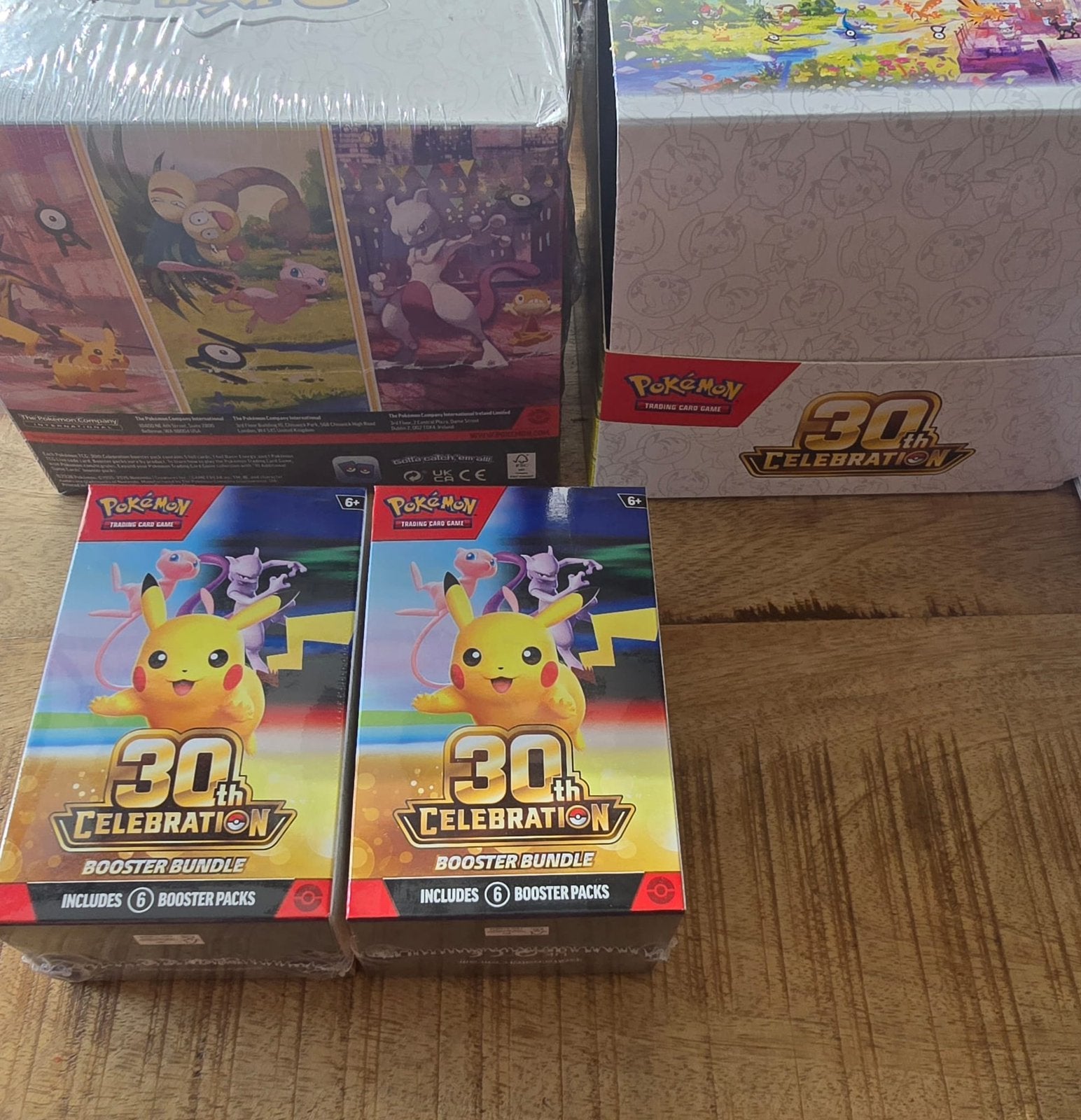 Pokemon 30 Anniversary booster bundle, mini-tin, losse hits.