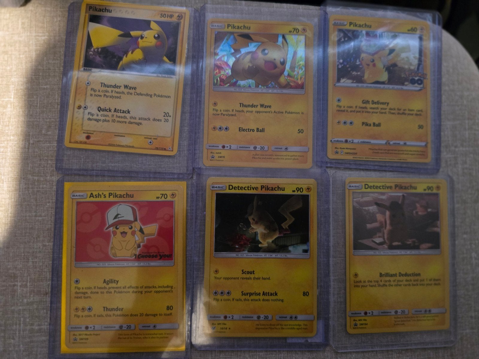 Pikachu, Ash's Pikachu, Detective Pikachu Pokémon kaarten, Ophalen of Verzenden, Gebruikt, Meerdere kaarten
