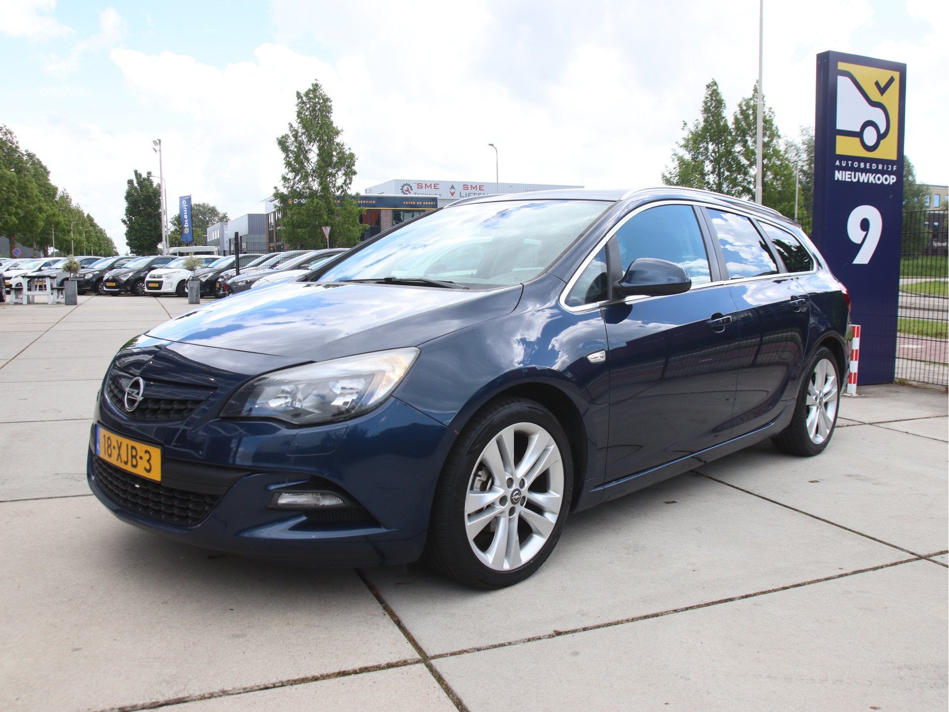 Opel Astra Sports Tourer 1.4 Turbo Sport Navi, PDC, LMV, Cru, Auto's, Euro 5, Stof, Gebruikt, 4 cilinders