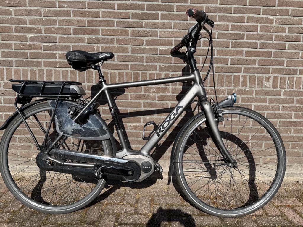 Nette Koga E-Nova herenfiets, Fietsen en Brommers, Elektrische fietsen, Zo goed als nieuw, Overige merken, 55 tot 59 cm, 30 tot 50 km per accu