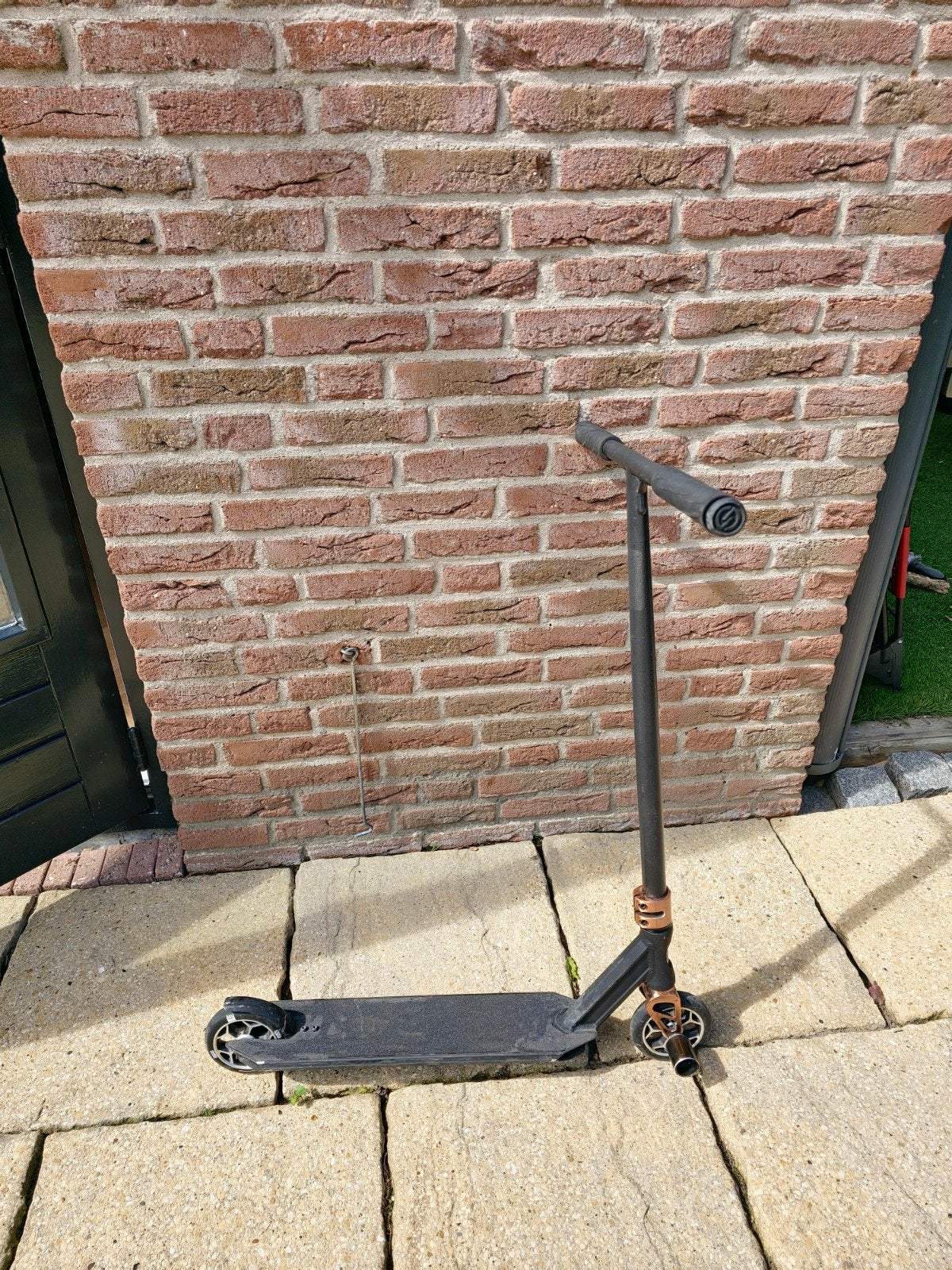 Stuntstep zwart met koperkleurige accenten, Fietsen en Brommers, Steps, Ophalen of Verzenden, Gebruikt, Gewone step, Oxelo Scooter