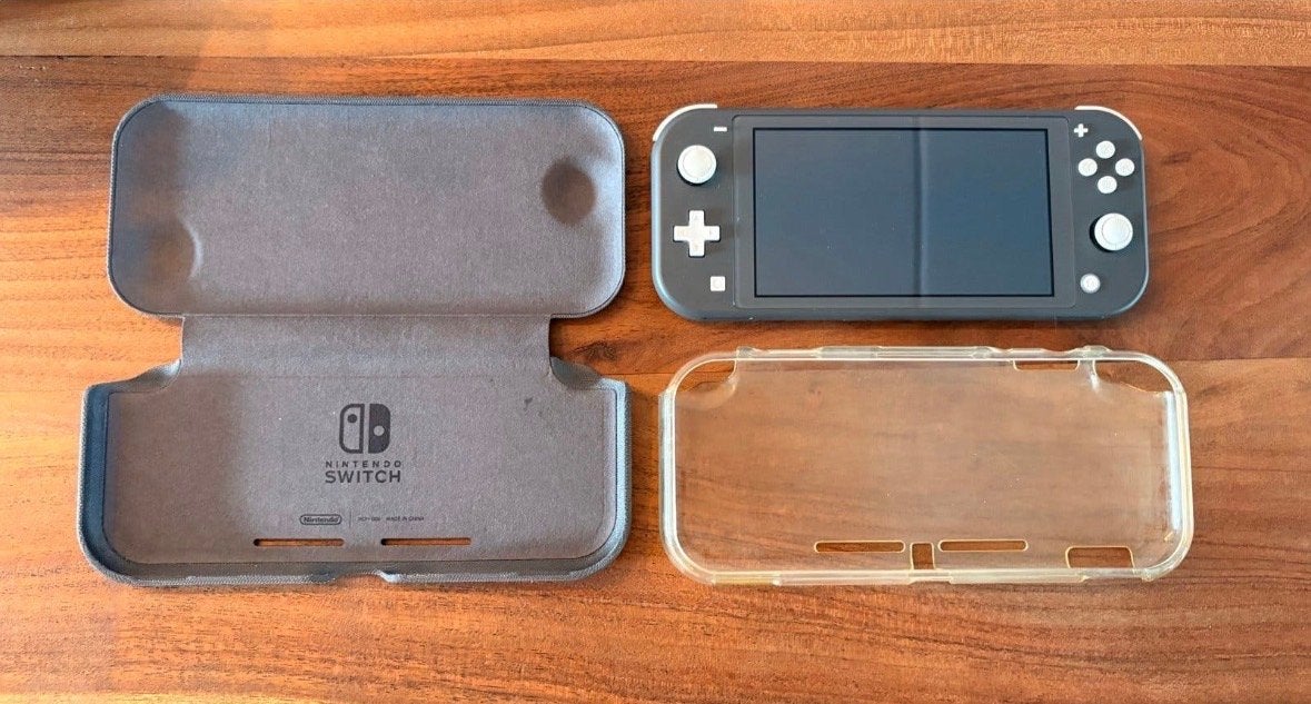 Nintendo Switch Lite Grijs met beschermcase, Spelcomputers en Games, Ophalen of Verzenden, Grijs, Zo goed als nieuw, Met beschermhoes of tas