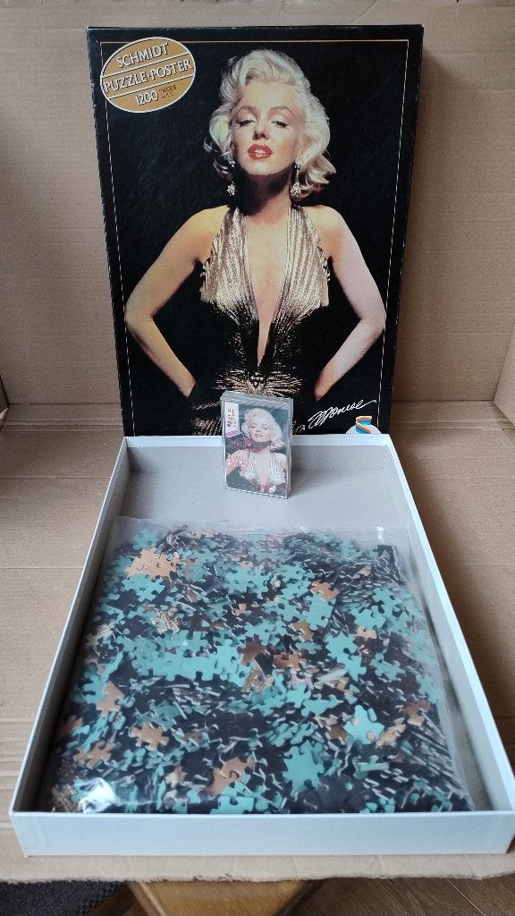 Set Marilyn Monroe puzzel poster + originele muziekcassette, Ophalen of Verzenden, Gebruikt, Film, Poster