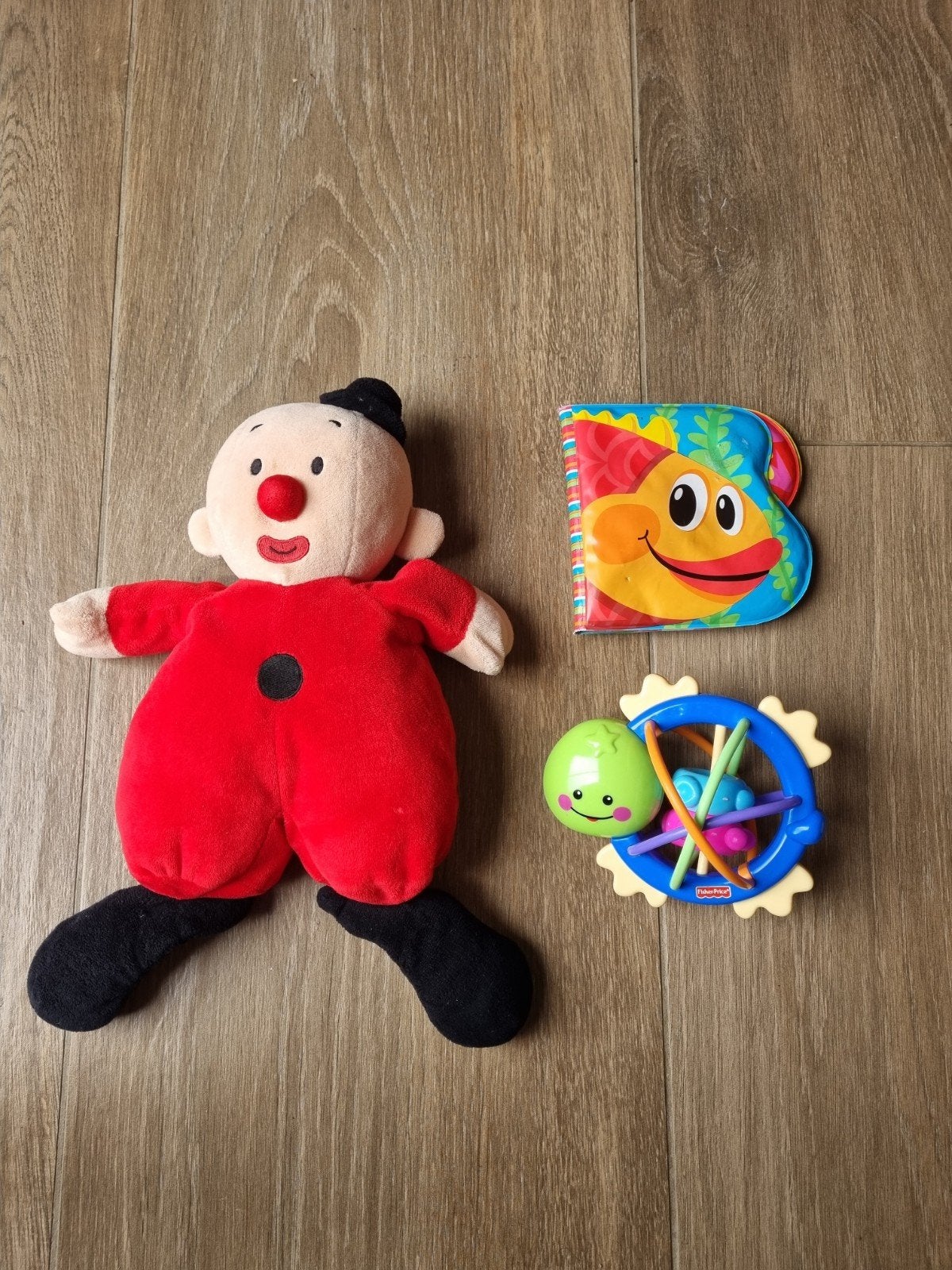 Fisher-Price rammelaar, bumba knuffel en badboekje, Ophalen of Verzenden, Gebruikt, Rammelaar