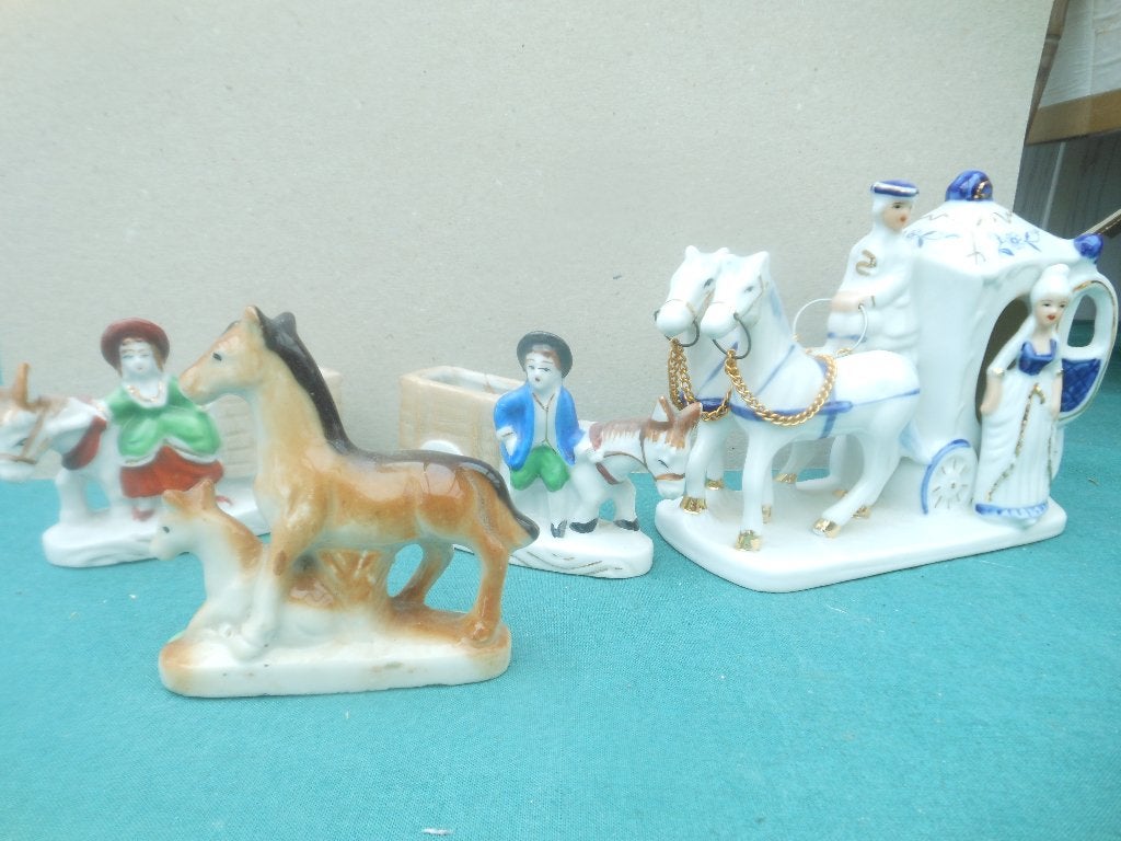 Porseleinen koets met paarden en figuren, Ophalen, Gebruikt, Mens