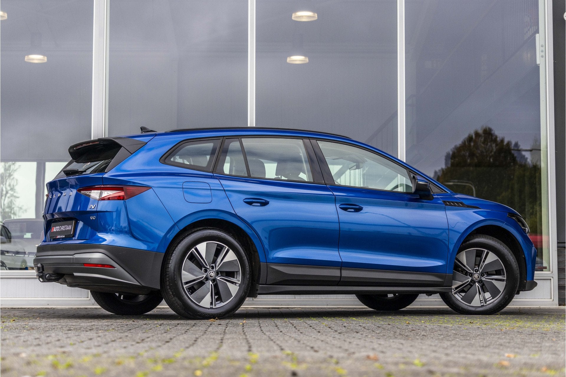 Skoda Enyaq iV 60 | SOH 92% | E-Trekhaak | Camera (bj 2022), Auto's, Achterwielaandrijving, Gebruikt, Zwart, Leder en Stof