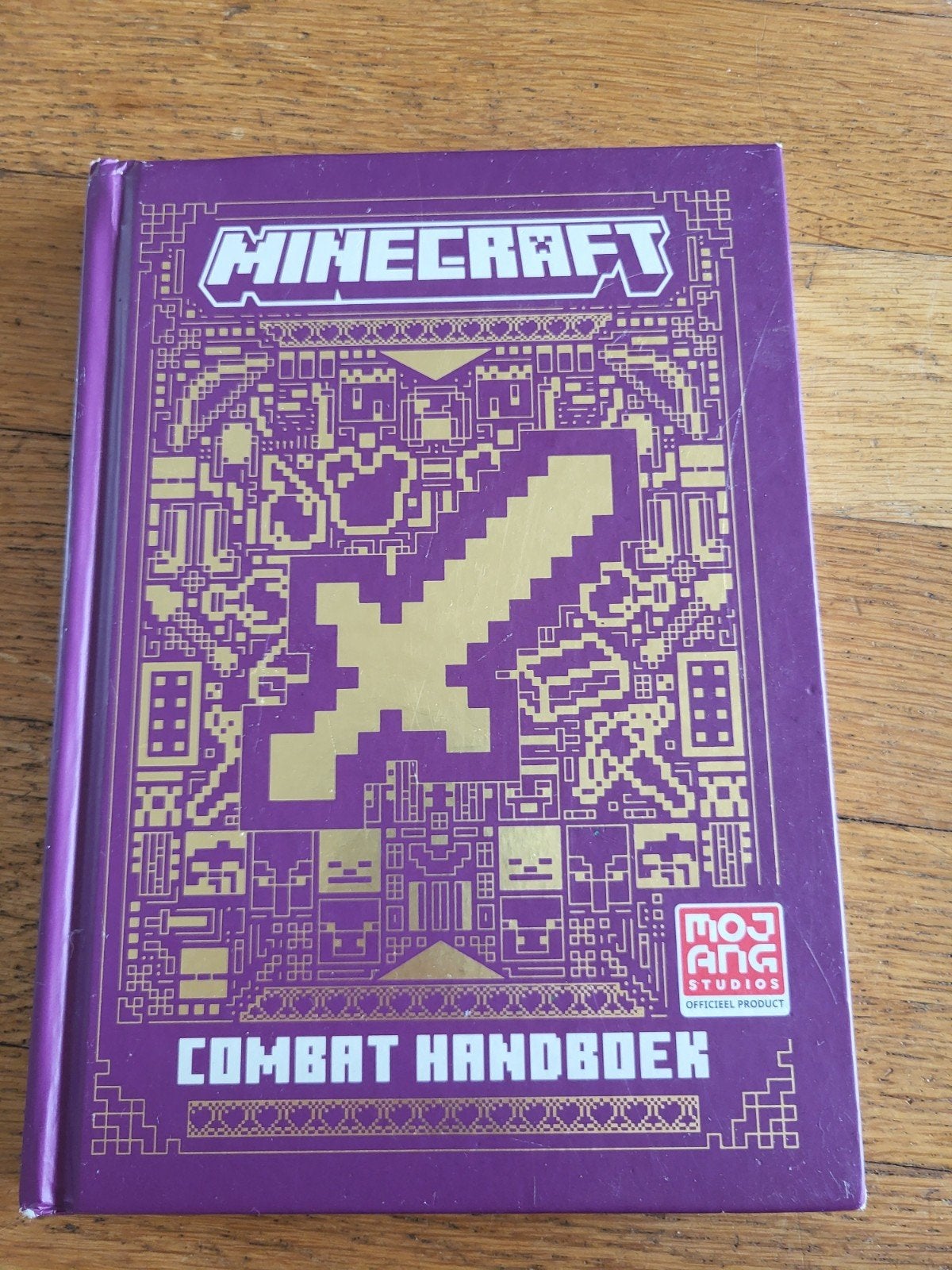 Minecraft Combat Handboek - Leer vechten en overleven, Ophalen of Verzenden, Zo goed als nieuw, Mojang Studios, Non-fictie
