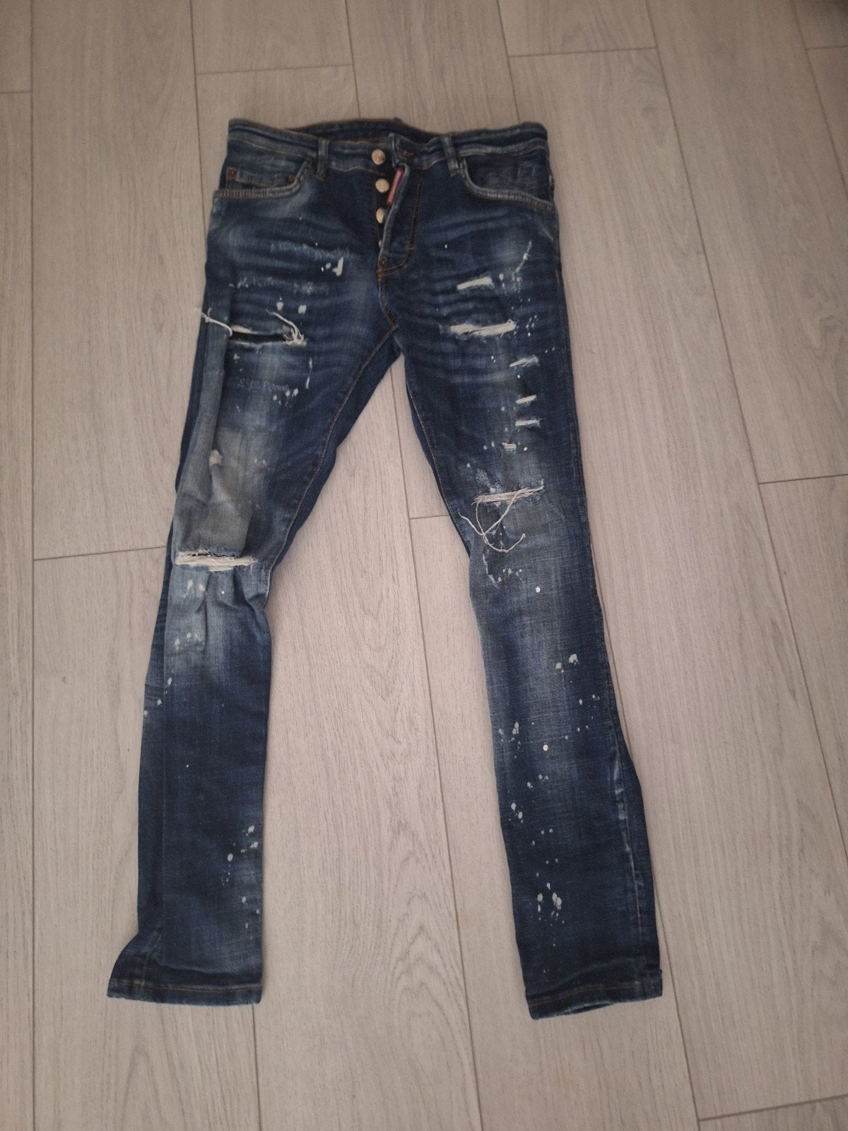 Mooie Dsquared2 spijkerbroek met verfspatten, Ophalen, Dsquared2, Blauw, Overige jeansmaten