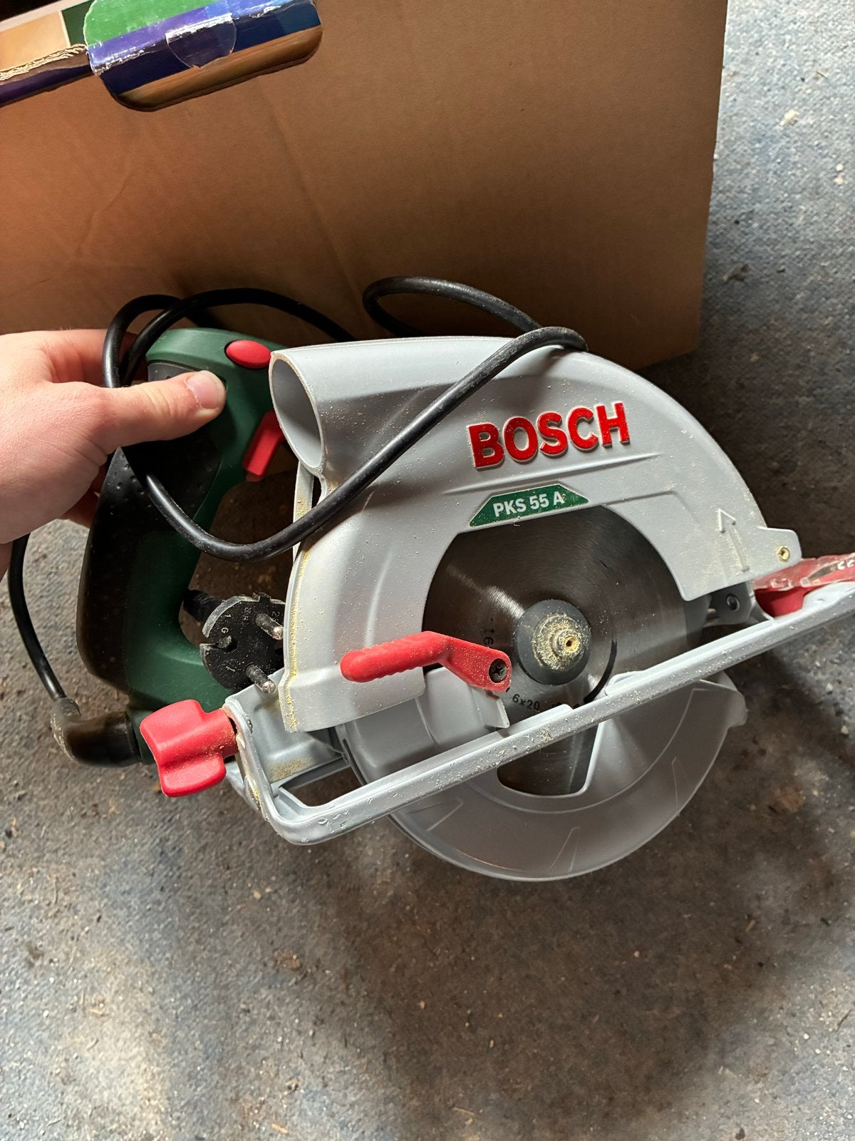 Bosch PKS 55 A Handcirkelzaag - 1200W, incl. zaagblad, Gebruikt, Cirkelzaag, Ophalen of Verzenden, 30 tot 70 mm