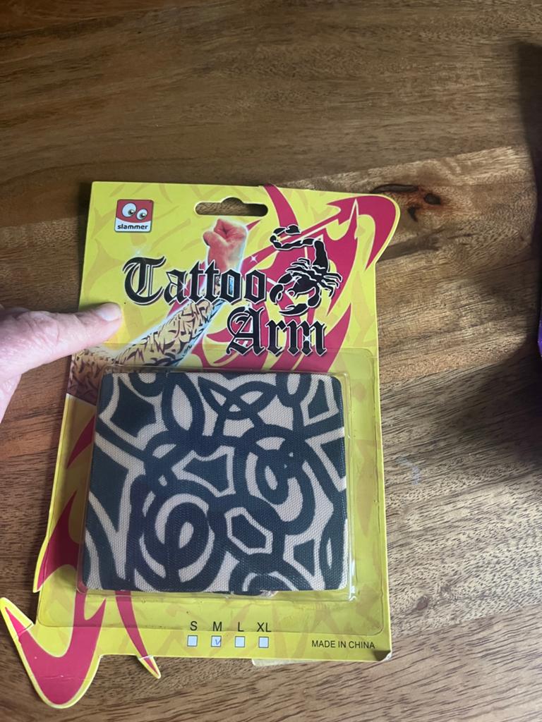 Tattoo arm geheel nieuw. Een maat., Ophalen of Verzenden, Zo goed als nieuw, Kostuum