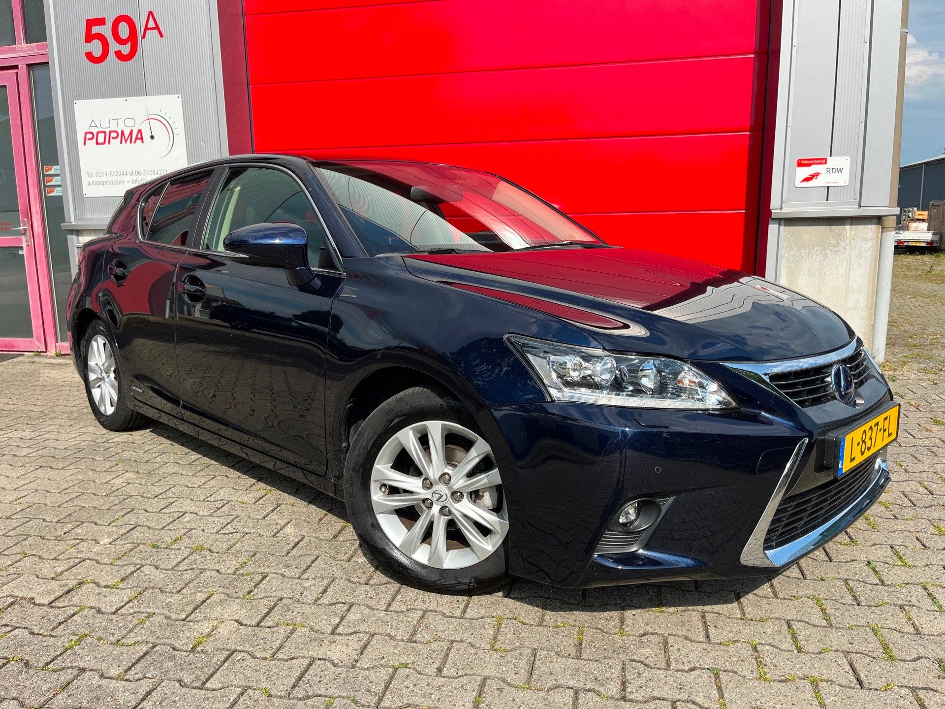 Lexus CT 200h Luxury Line / Leder / Elektr. memo stoel / Mar, Auto's, Lexus, 4 cilinders, Blauw, Leder, 26 km/l