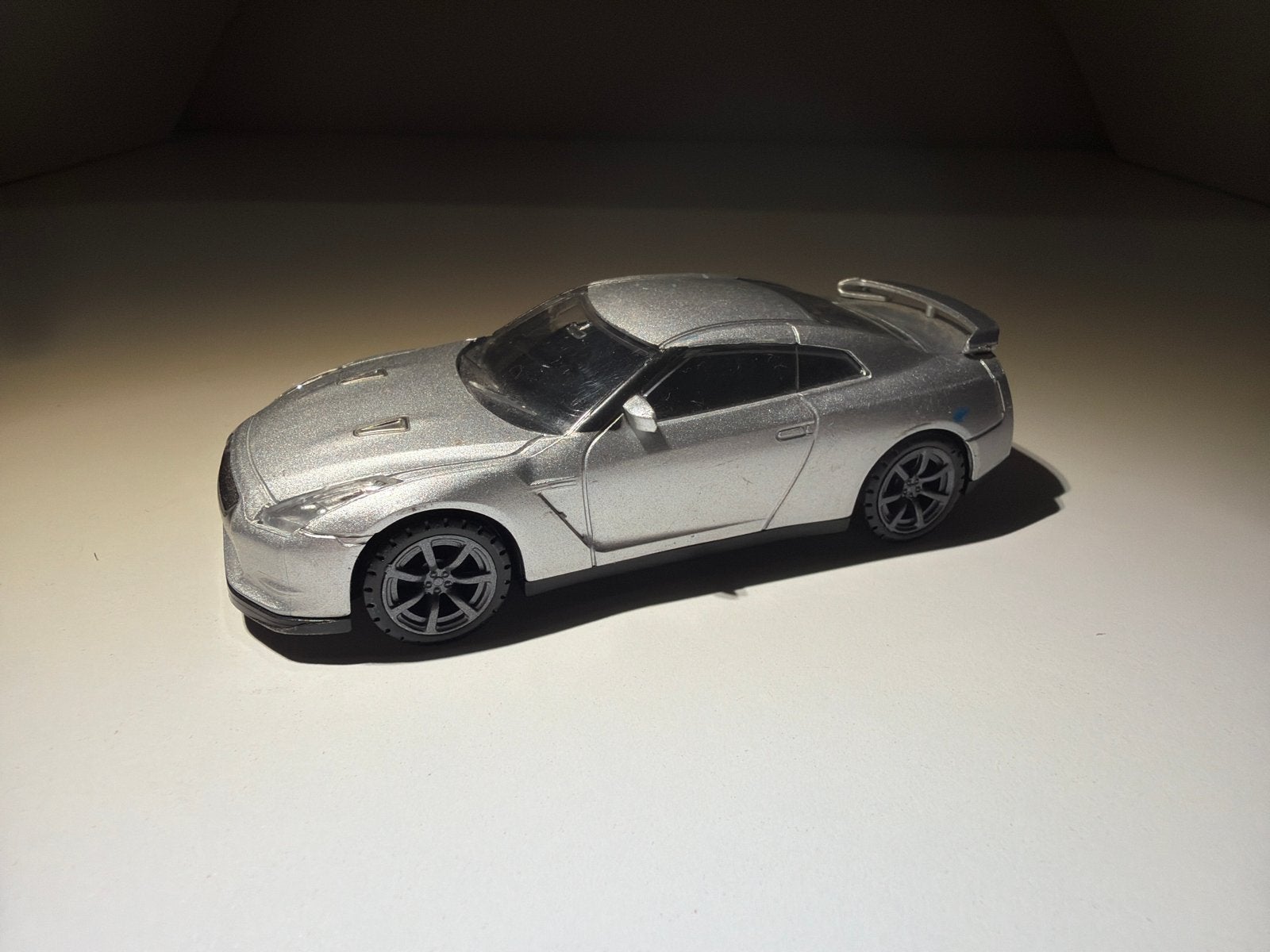 Nissan GT-R 1:43, Hobby en Vrije tijd, Ophalen of Verzenden, Gebruikt, Auto, Overige merken