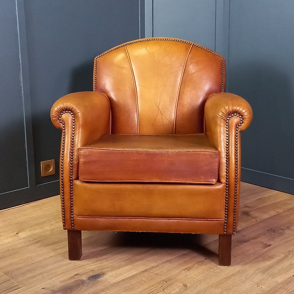 Karaktervolle Schapenleren Fauteuil (2 van 2), Huis en Inrichting, Fauteuils, Gebruikt, Leer, 50 tot 75 cm, 75 tot 100 cm, Ophalen of Verzenden