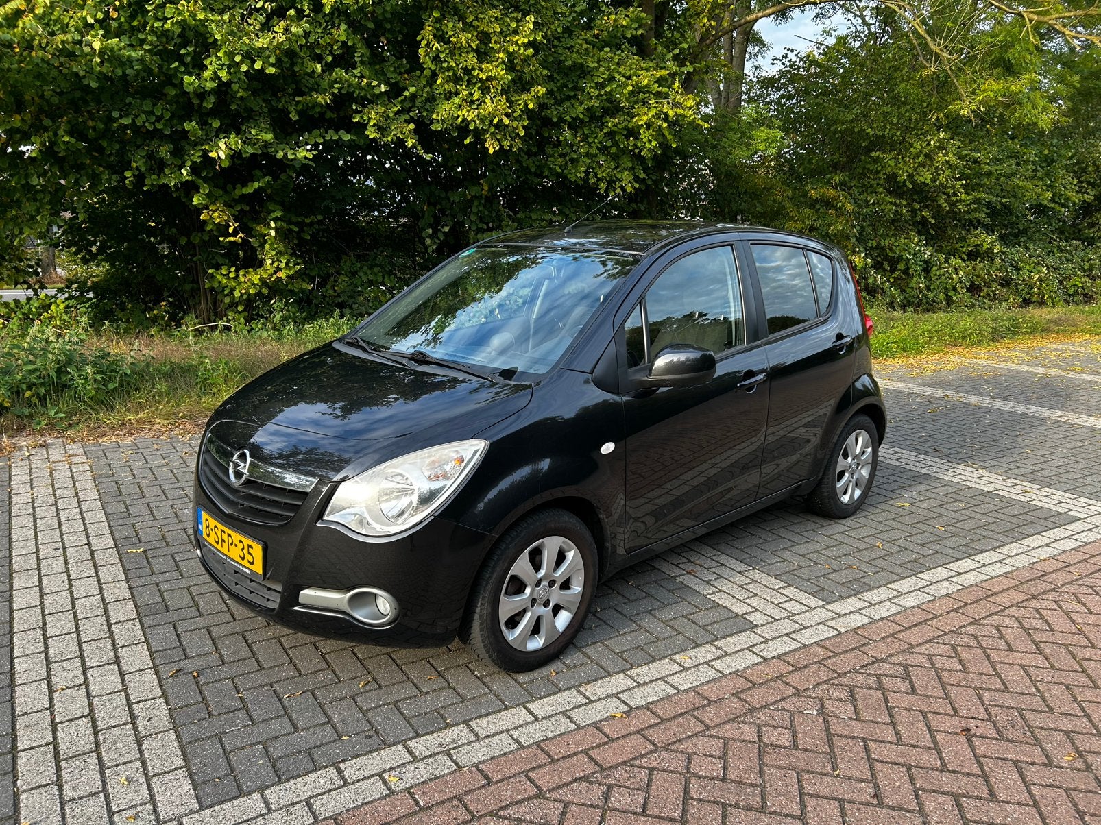 Opel Agila 1.2 16V 2010 Zwart, Voorwielaandrijving, Stof, 40 €/maand, 4 cilinders