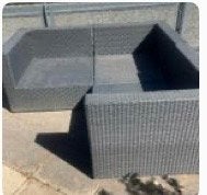 Zwart wicker eiland loungeset met 4 elementen en hocker, Tuin en Terras, Tuinsets en Loungesets, Ophalen, Gebruikt, Loungeset