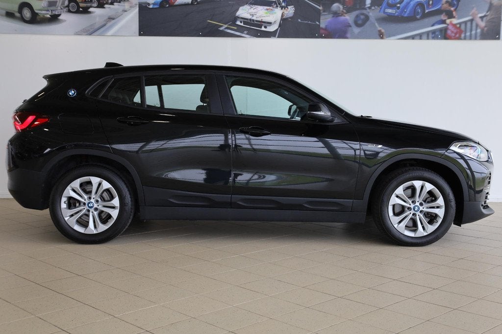 BMW X2 xDrive25e Leder 'Dakota' Schwarz | Navigatiesysteem |, Auto's, BMW, Automaat, X2, Gebruikt, Met garantie (alle)
